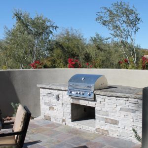 Stone Siding used to create a outdoor kitchen area.