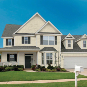 An Image of a home with our Perfection Shake Shingle Siding from Kaycan in Almond Siding Colour
