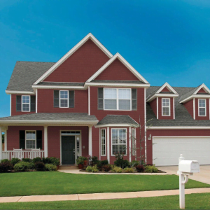 An Image of a home with our Perfect Shake Shingle Siding from Kaycan in Brick Siding Colour