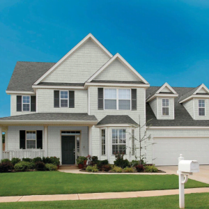 an image of a residential home with our perfection shake shingle cedar look siding from kaycan in siding colour classic linen