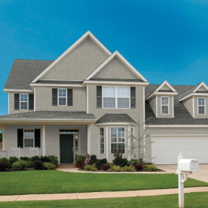 an image of a residential home with our perfection shake shingle cedar look siding from kaycan in siding colour clay
