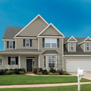 an image of a residential home with our perfection shake cedar look siding from kaycan in siding colour dusk