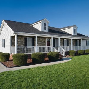 Stone siding added to the overhang of the front porch on a home, in sterling colour.