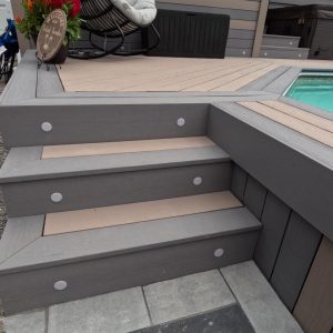 Flight of 3 Composite Deck Stairs with Gemstone In-Deck Lighting Boardered with Ash Grey Coloured Composite with Sand Colour Trunorth Composite Filler.