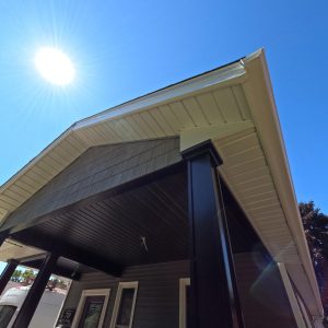 Dusk Perfection Shake used as a gable accent feature on a covered porch addition constructed by Aurora Exteriors Inc.