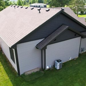 Birds eye view of the back side of a home recently renovated by Aurora Exteriors Inc.